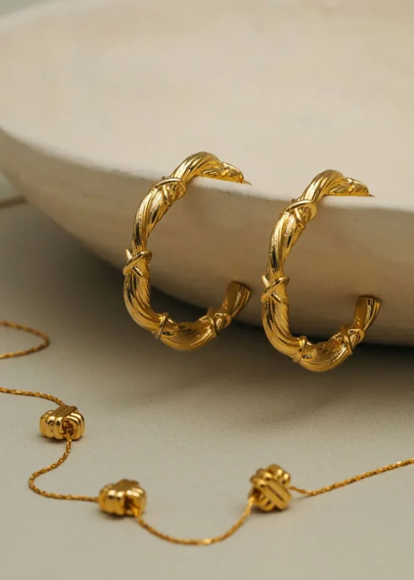 Orelia Woven Twist & Cross Mid-Size Hoop Earrings | Earrings